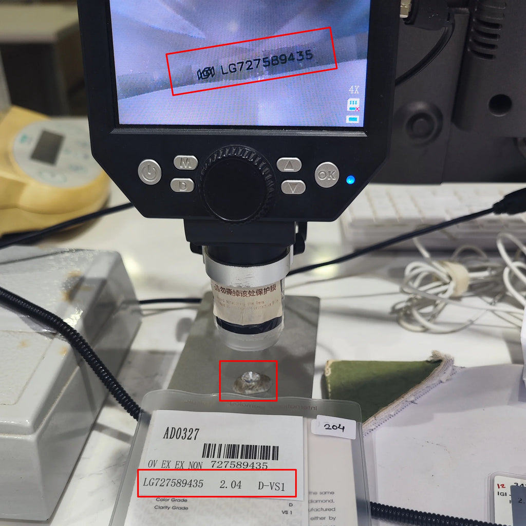 Small round lab-grown diamond sample on viewing platform of testing machine