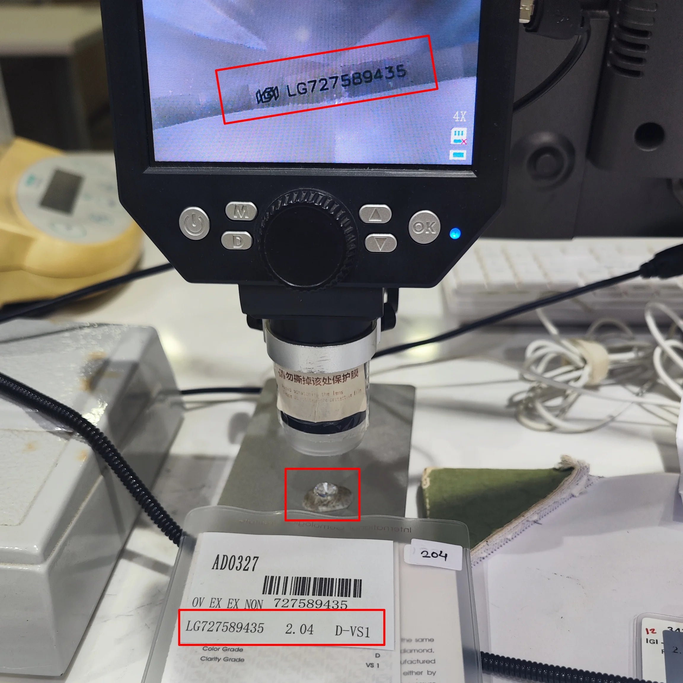 Small round lab-grown diamond sample on viewing platform of testing machine