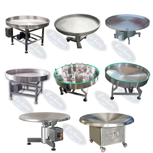 Set of stainless steel rotary turntables with round tops and control panels