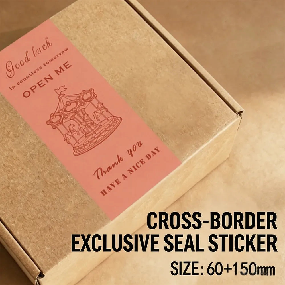 Orange rectangle seal sticker with “Good luck” “OPEN ME” on a kraft parcel