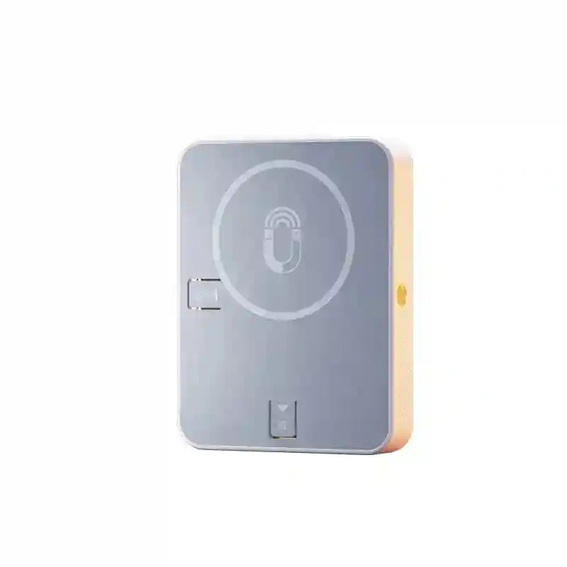 Gray rectangular magnetic power bank with wireless charging ring and side power button for smartphone charging.