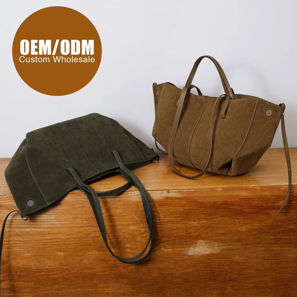 Vintage-style designer suede leather handbags in olive green and brown with dual handles and button side details.