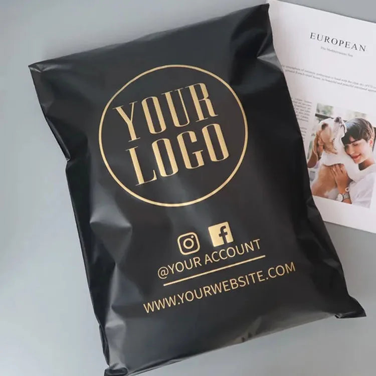 Black poly mailer bag with gold “YOUR LOGO” circle and social icons