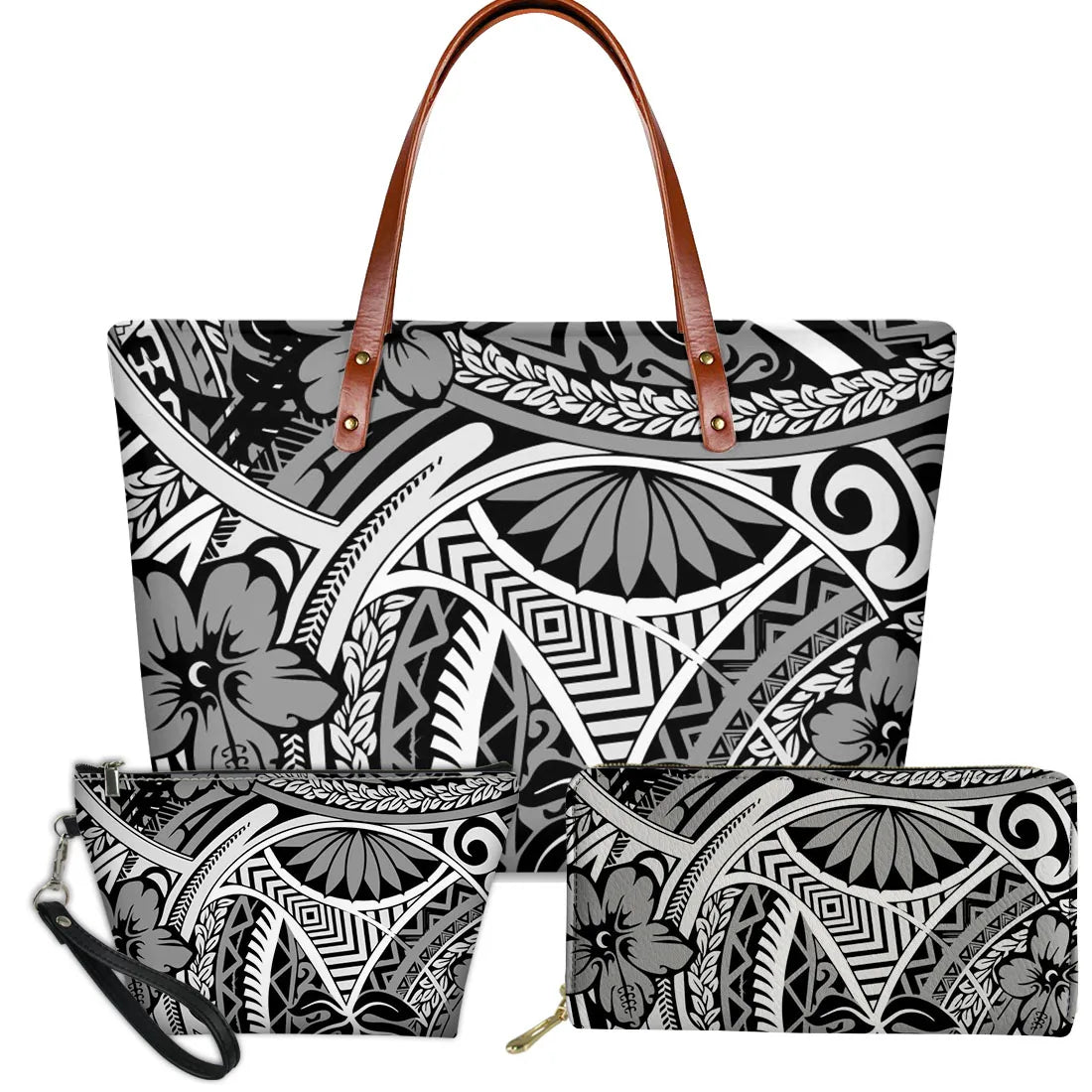 3-piece black and white Polynesian tribal turtle and floral print handbag set with brown leather handles and zipper.