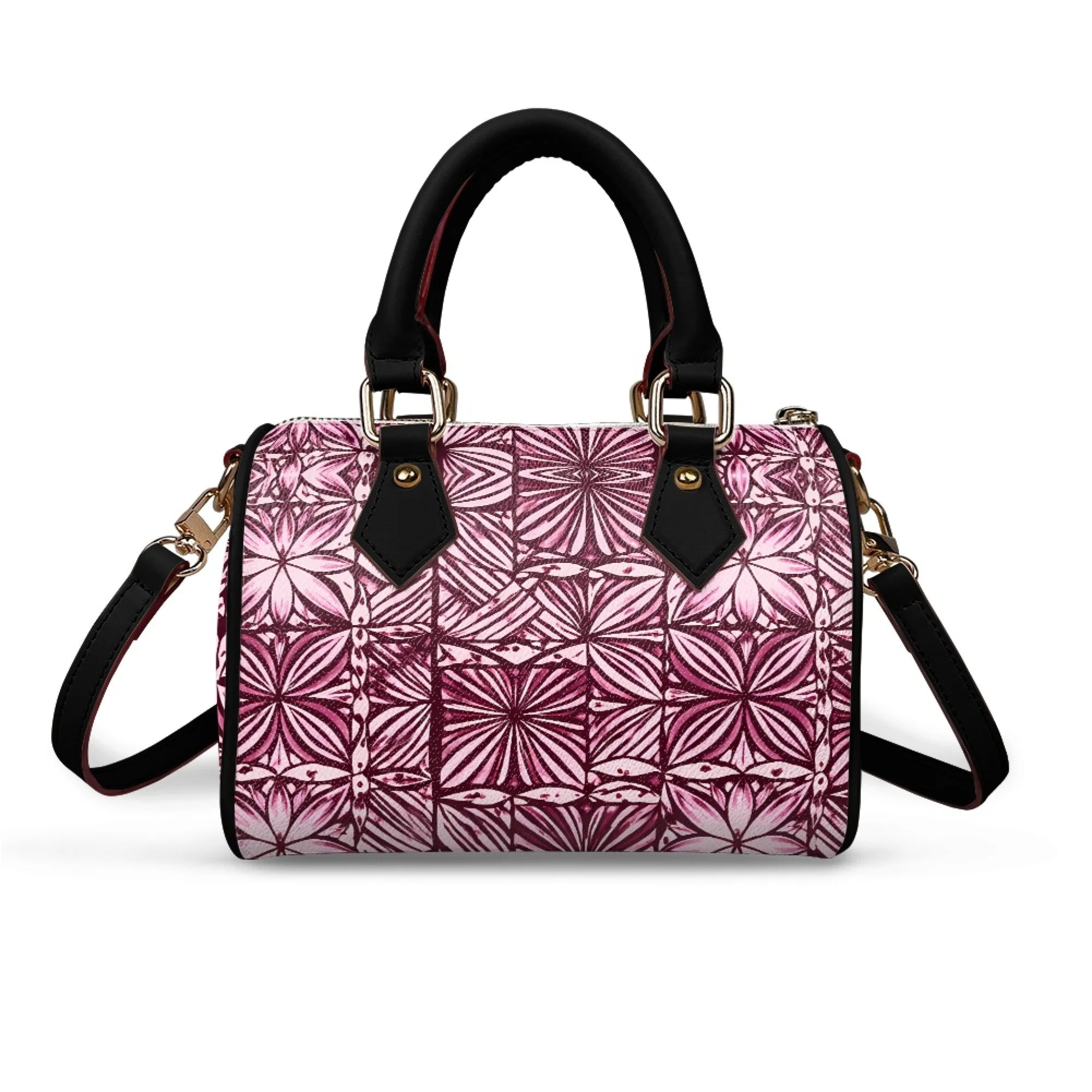 Pink tribal print pillow handbag with black top handle and shoulder strap. Stylish women's trunk purse with gold tone.