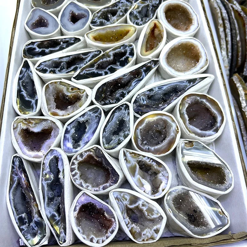 Agate geode crystal slice assortment in a gift box with dark and blue highlights