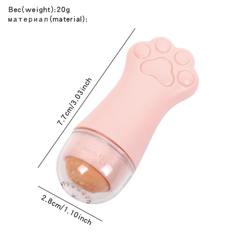 Light pink cat-paw shaped facial oil absorbing roller with a round volcanic stone ball and clear protective cap.