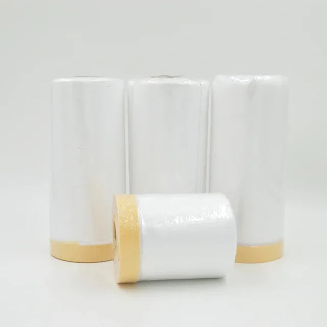 White masking film roll with tan adhesive tape band on outer layer