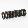 Black electrical insulation tape roll set with exposed tan adhesive liner