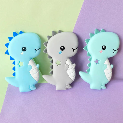 Blue, grey, and green silicone dinosaur teething toys for baby teething relief.