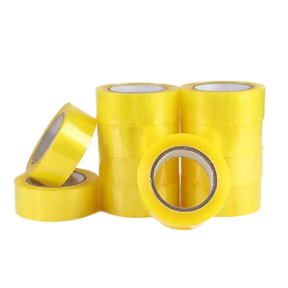 Assorted yellow packaging tape rolls with one small roll and open core views
