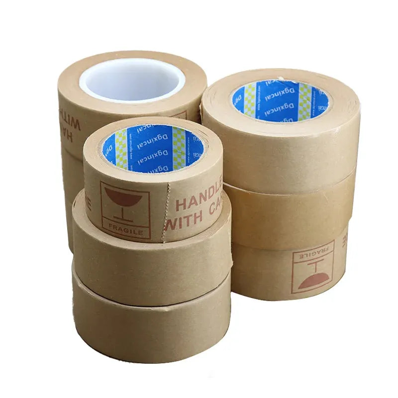 Brown kraft packing tape rolls with stacked arrangement and “HANDLE WITH CARE” print