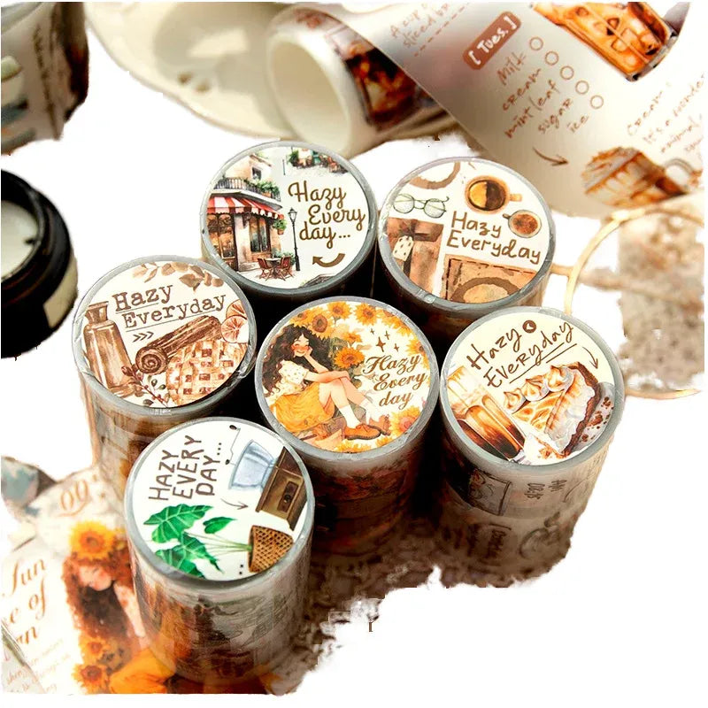 Matte PET tape rolls with printed “Hazy Everyday” designs arranged in a row.