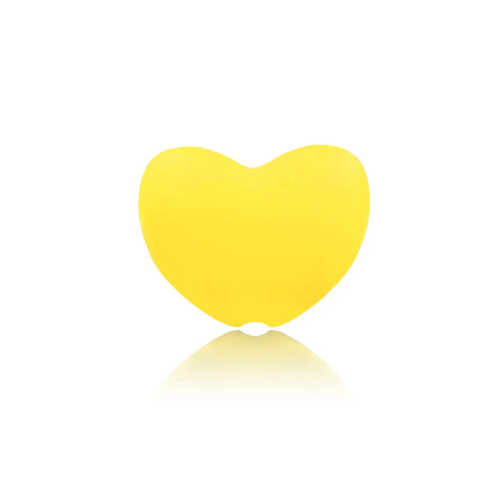Yellow heart silicone teething toy for baby pain relief.