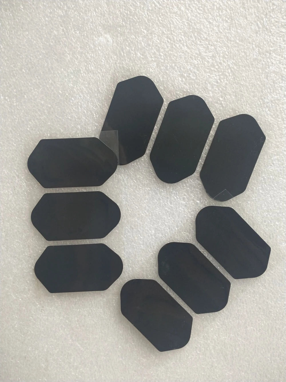 Set of black replacement film stickers for 3D 4D Hifu beauty machine cartridges on a white protective surface.