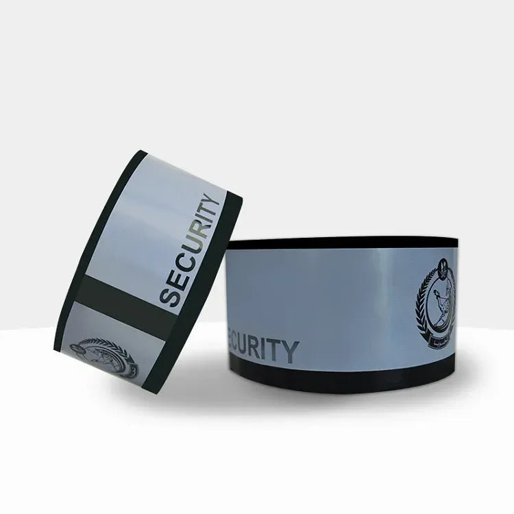 Gray security tape roll with black edge and bold “SECURITY” text