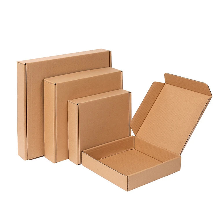 Brown corrugated cardboard shipping carton set, stacked with one open mailer box