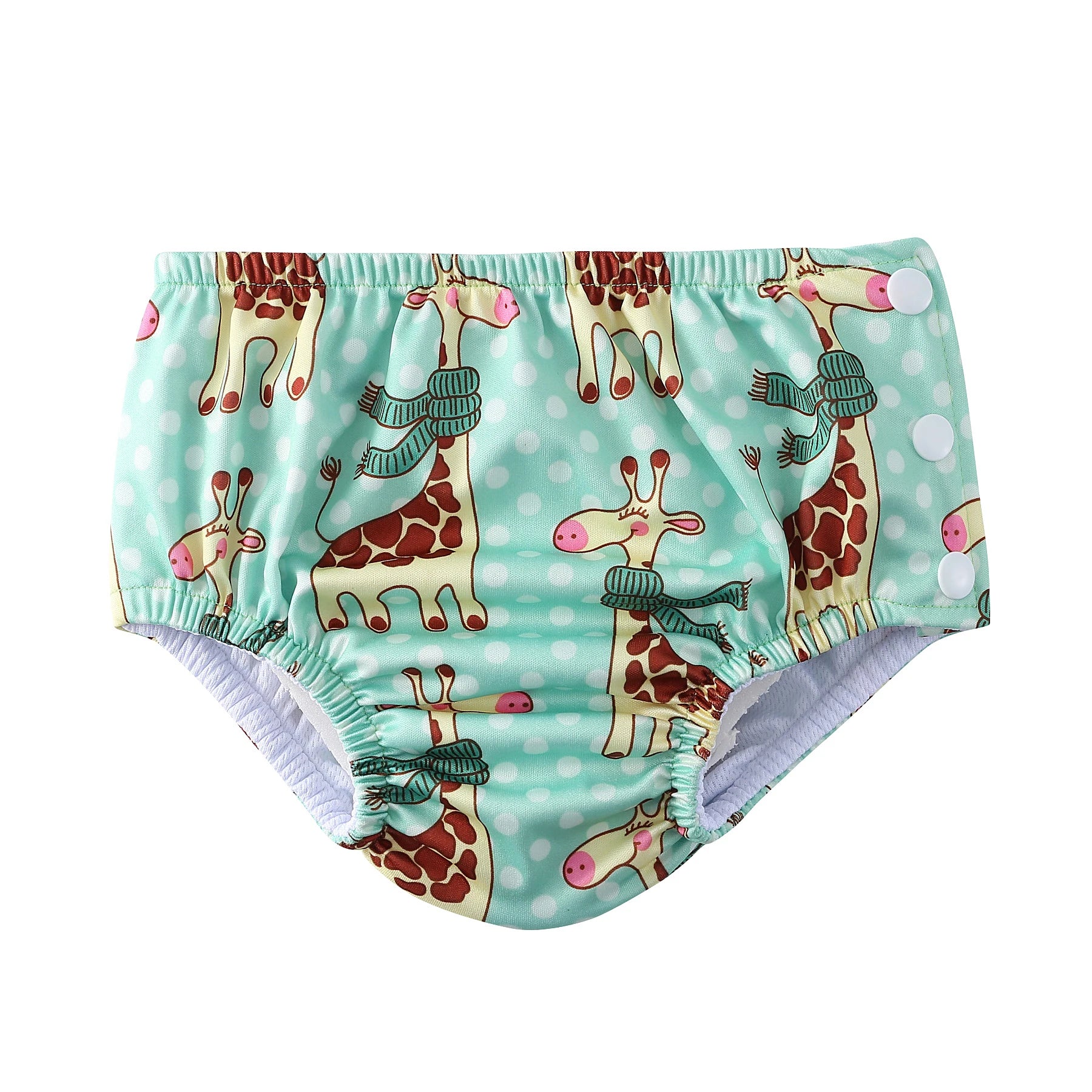 Reusable baby swim diaper in teal with a cute giraffe and polka dot print, featuring adjustable side snap buttons.