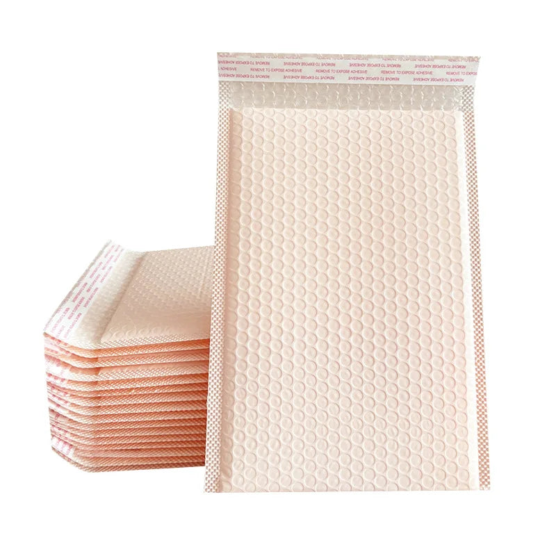 Nude beige padded poly bubble mailer envelope with bubble texture and stacked bags