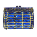 Blue crystal evening clutch bag with geometric rhinestone embellishments and luxury gold-tone frame. Designer handbag.