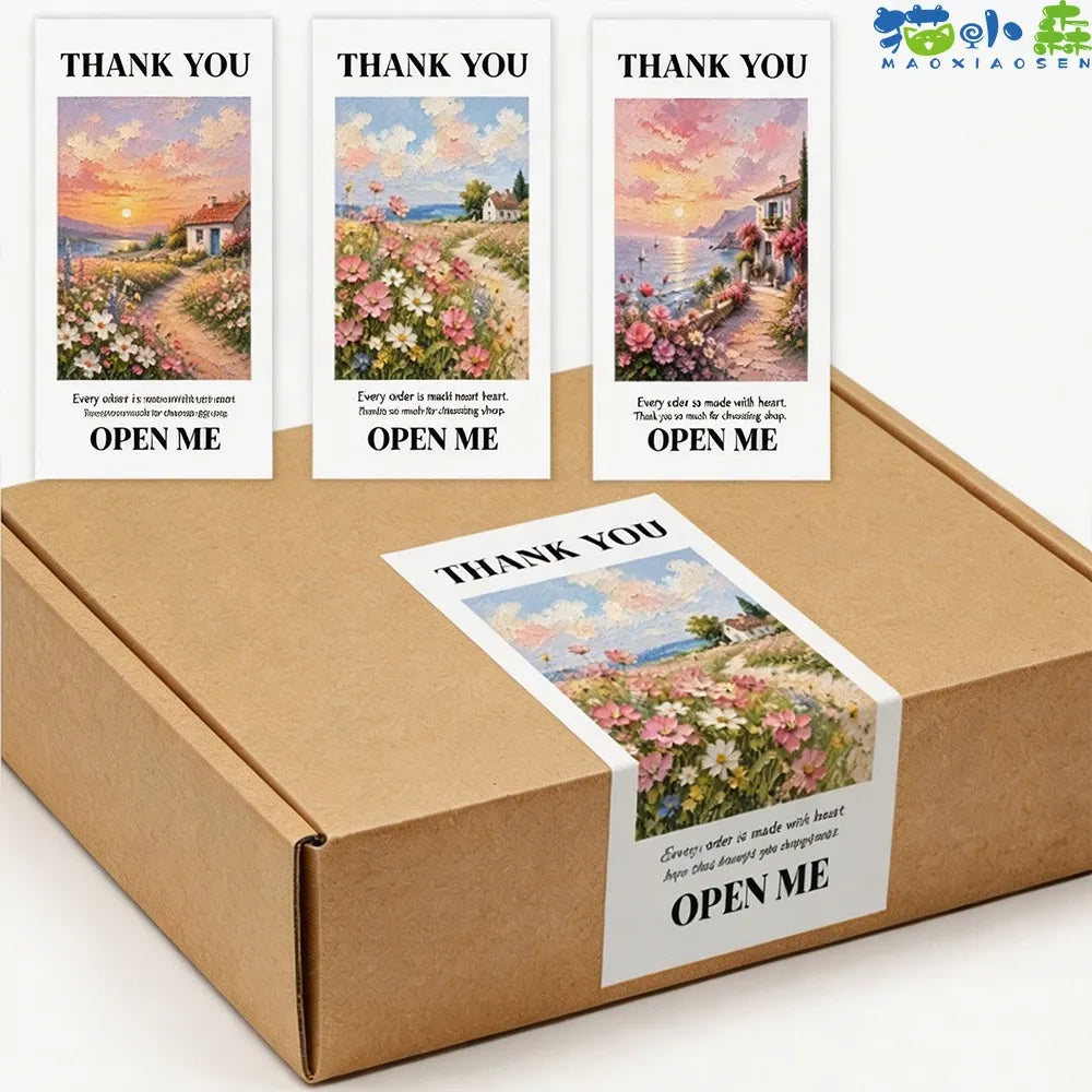 Landscape thank-you seal stickers with "OPEN ME" text on white cards