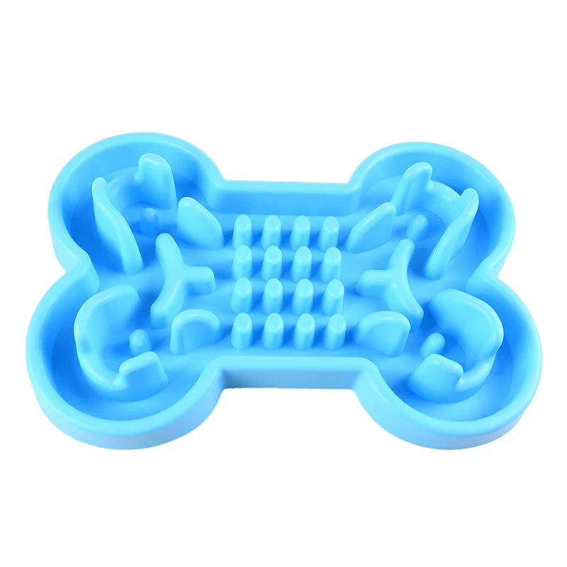 Blue bone-shaped rubber slow feeder bowl for dogs and cats to prevent choking and encourage healthy eating.