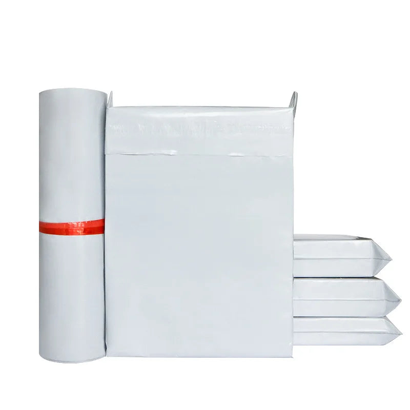 White plastic shipping mailer envelope with gusseted edges and adhesive seal tape, plus roll