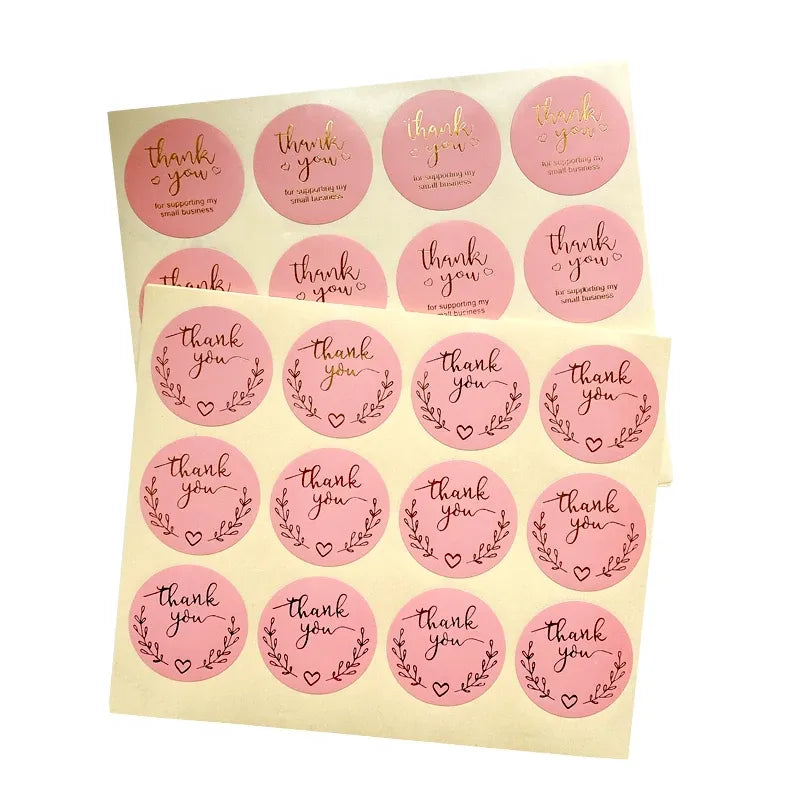Pink round thank you stickers sheet, gold-foil script with wreath and hearts