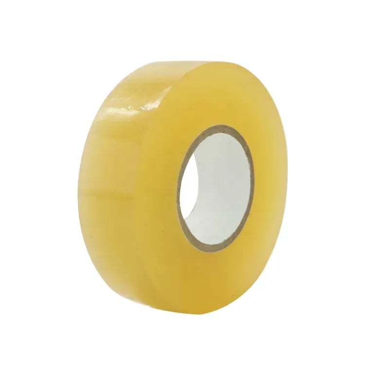 Yellow packaging tape roll with hollow core, clear adhesive surface