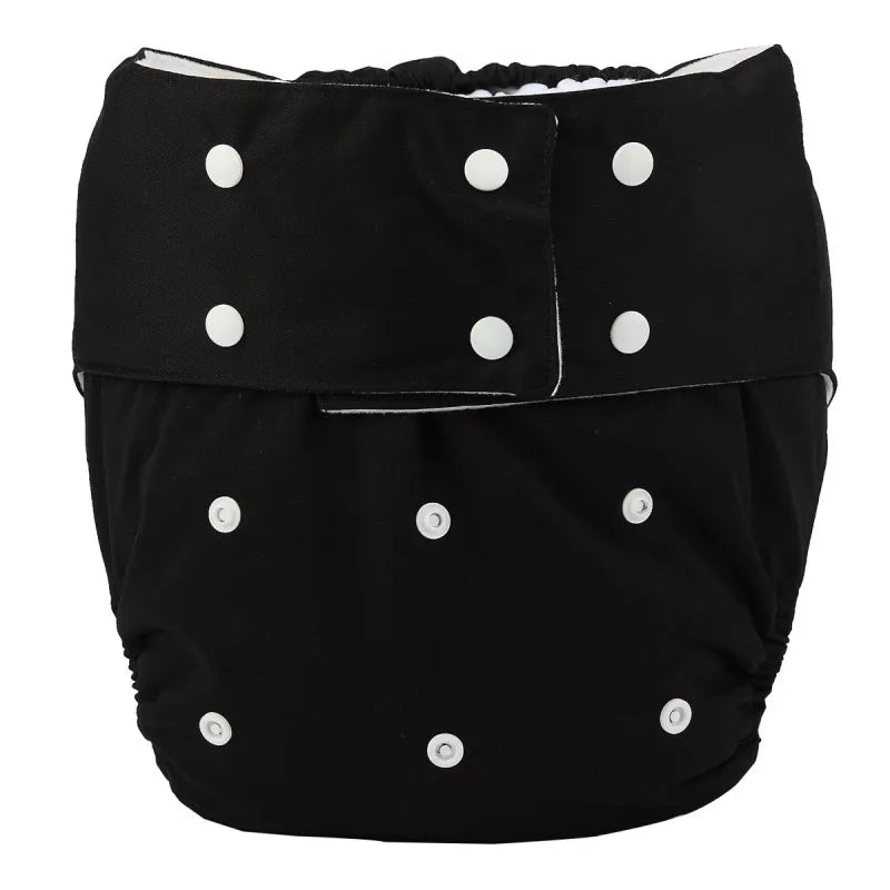 Reusable solid black cloth diaper with white snap buttons for adjustable baby care fit.
