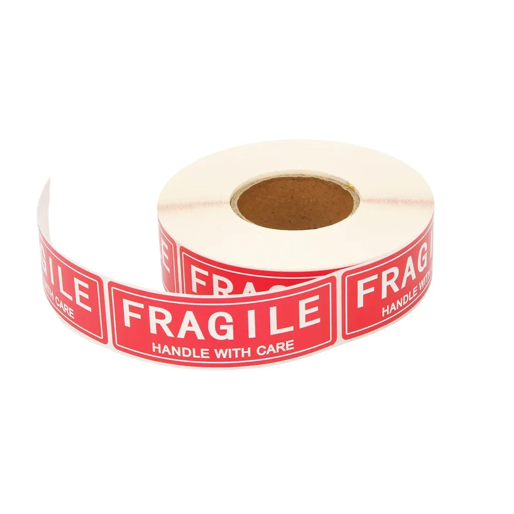 Fragile shipping warning label roll with repeating red “FRAGILE” message and icons