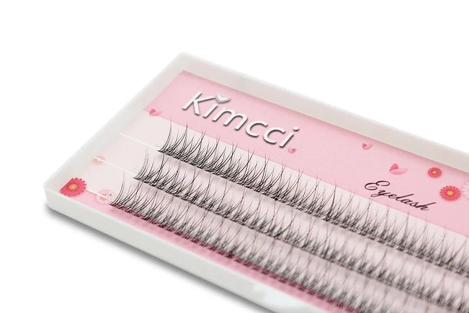 Kimcci 3D mink individual eyelash clusters in a pink branded tray with floral accents.