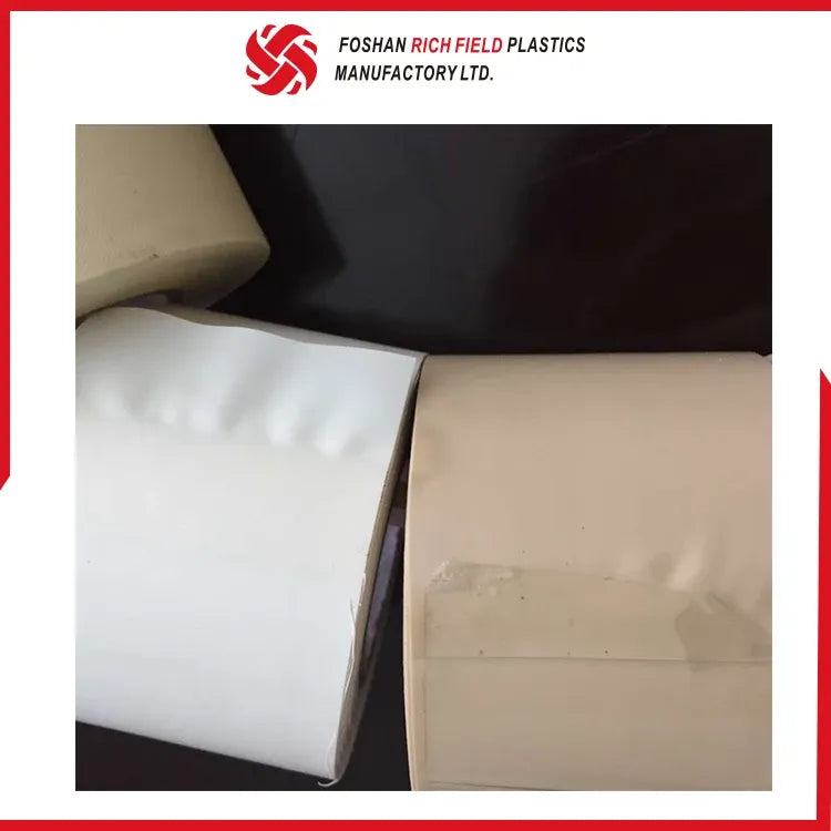 Two white PVC air duct tape rolls with overlapping tape edges