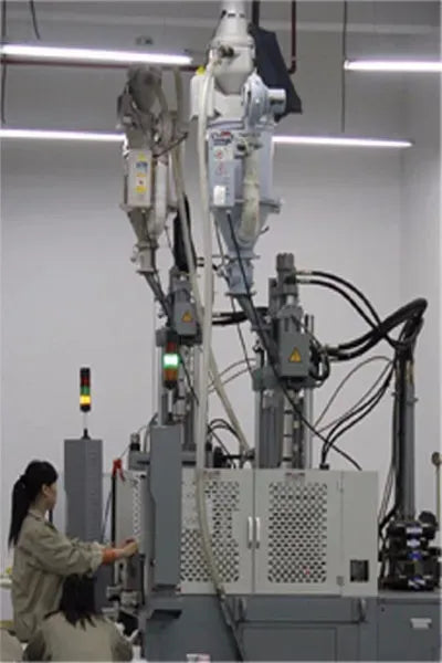 Industrial robotic system with articulated arms and control unit in lab