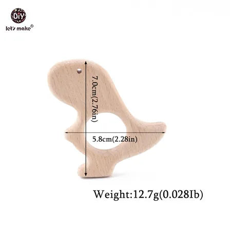 Natural wood dinosaur teething toy for baby, light beige, eco-friendly relief for teething.