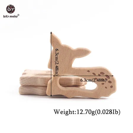Natural beige wood deer teething toy for babies.