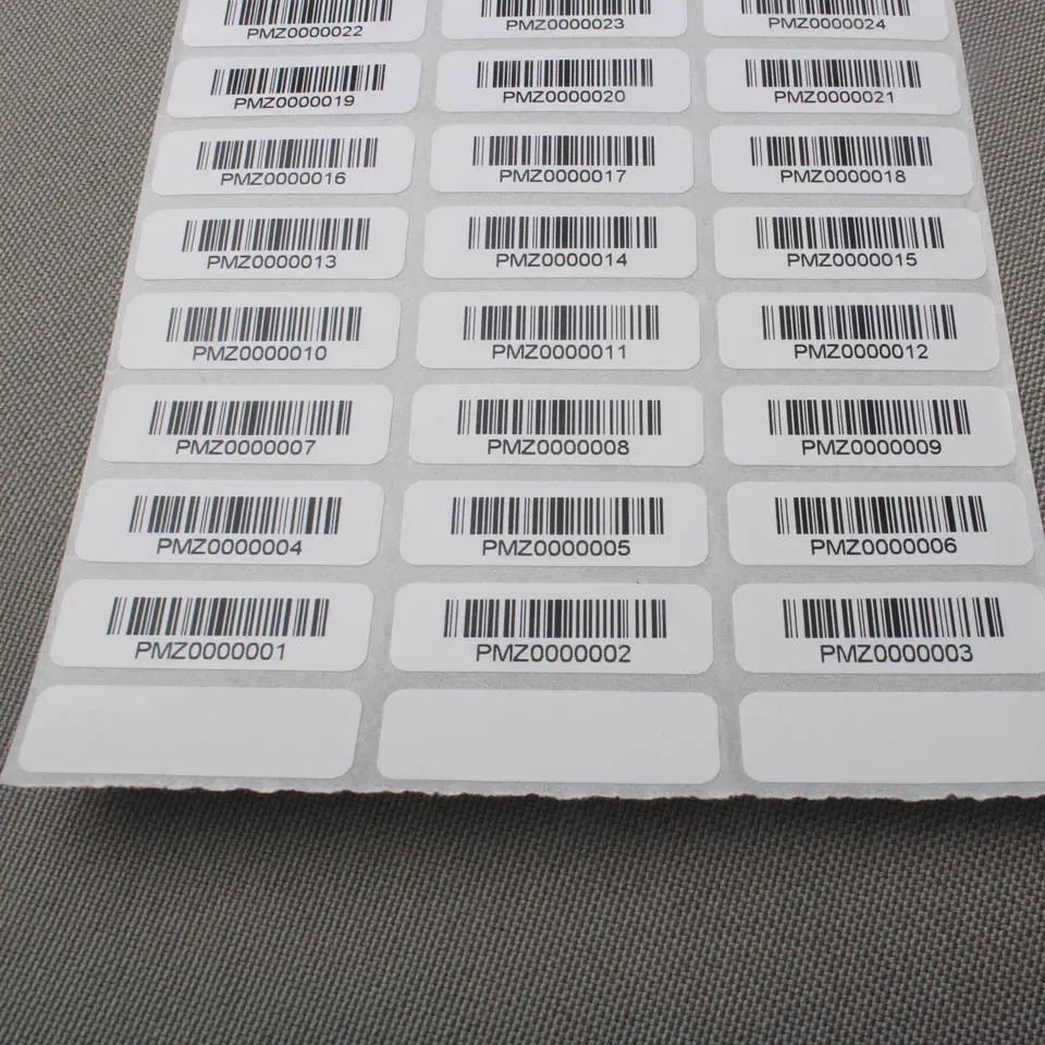 Barcode label sticker sheet with rows of white adhesive labels and printed barcodes