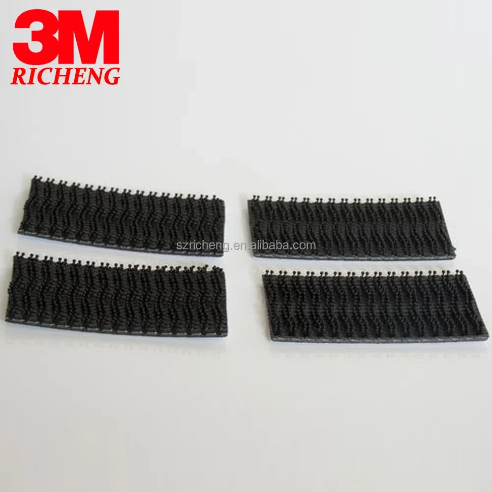 3M Dual Lock black hook tape patches, rectangular strips with pin-like texture