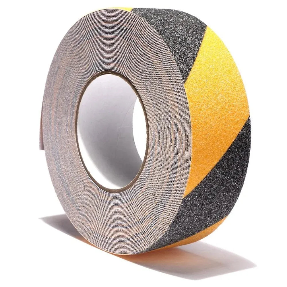 Non-slip safety grip tape roll with gray backing and black-and-yellow diagonal grip stripes