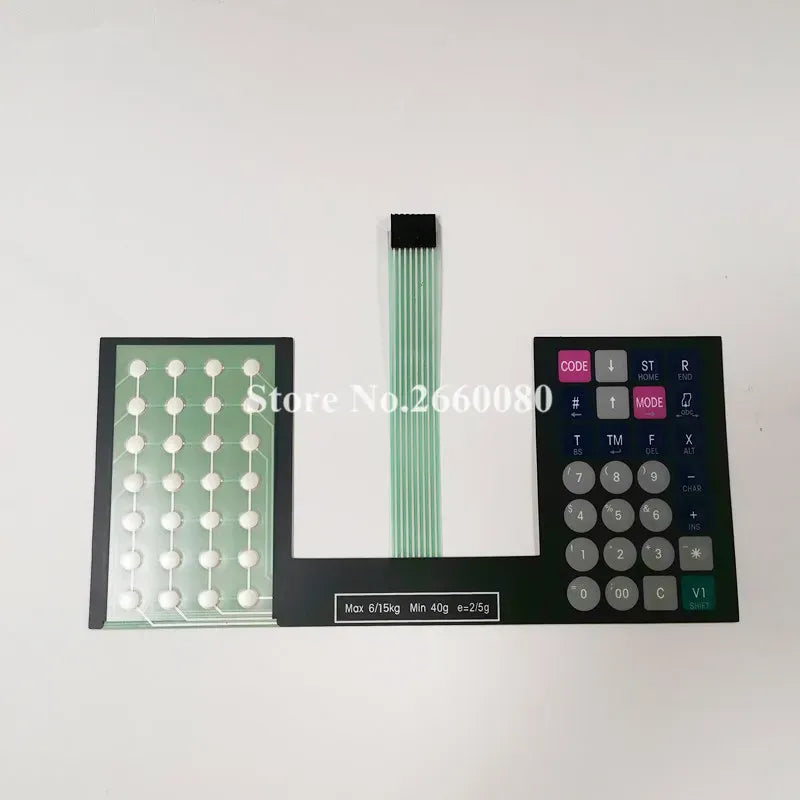 Flexible scale keypad film with left dot grid, numeric keypad, and center ribbon cable