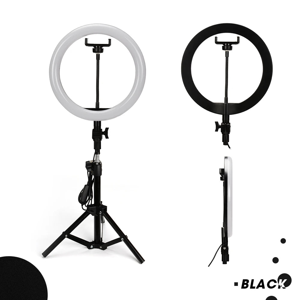 White and black LED ring lights with phone mounts on adjustable tripod stands for content creation and photography.