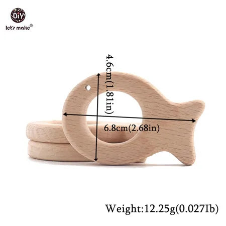 Natural wood fish teething ring for baby, light beige color, non-toxic wood teether for infants.