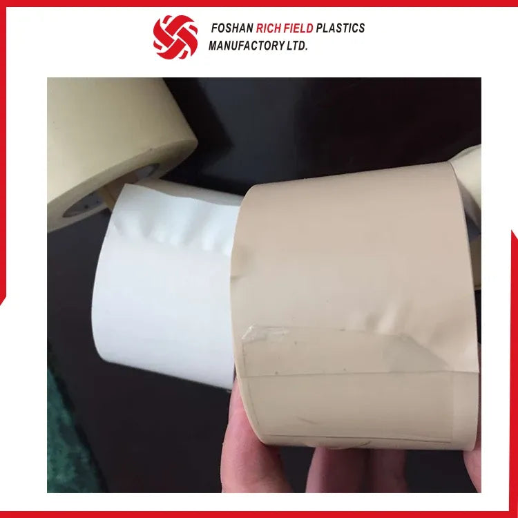 White PVC air duct tape roll with sheet-like tape layer and another roll behind