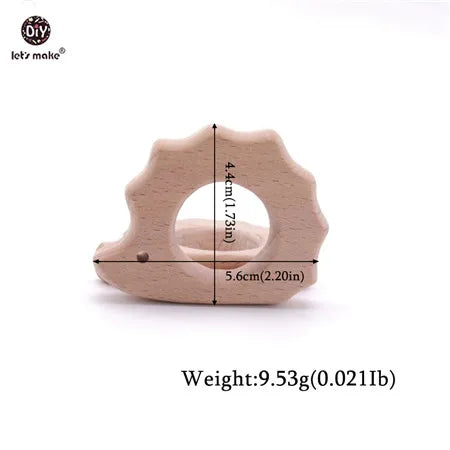 Natural wood hedgehog teething toy for baby. Light brown, eco-friendly teething ring.