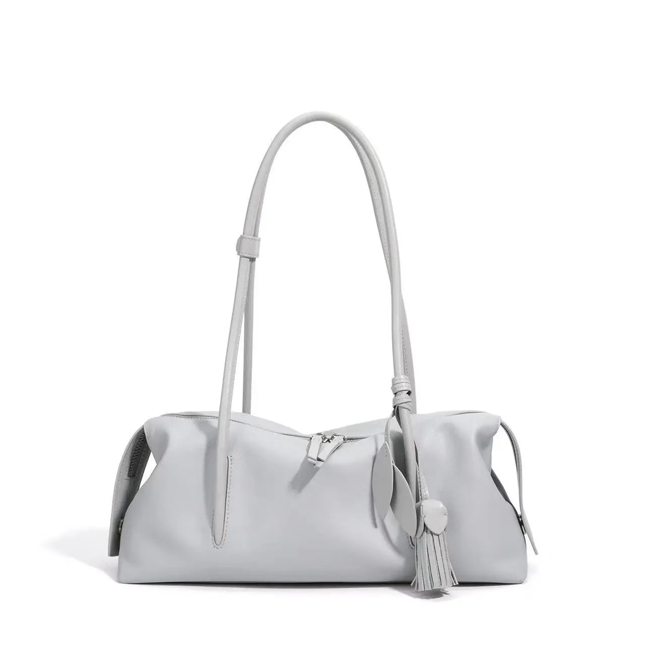 Light gray genuine cowhide leather shoulder bag, luxury underarm trunk style with zipper closure and tassel detail.