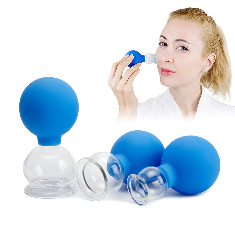 Woman using a blue silicone and glass vacuum cupping massager for facial and body therapy on a white background.