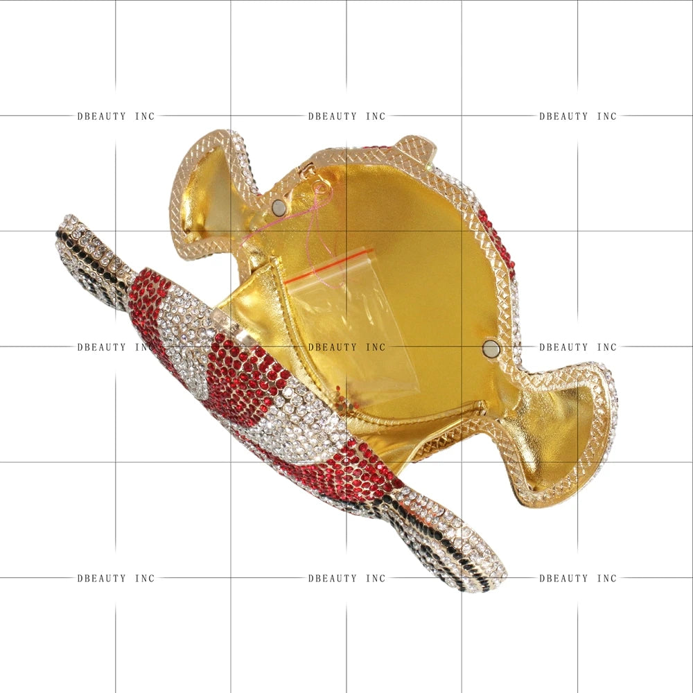 Open candy-shaped designer handbag with red, white, and black rhinestones, gold interior, and sparkling crystal finish.