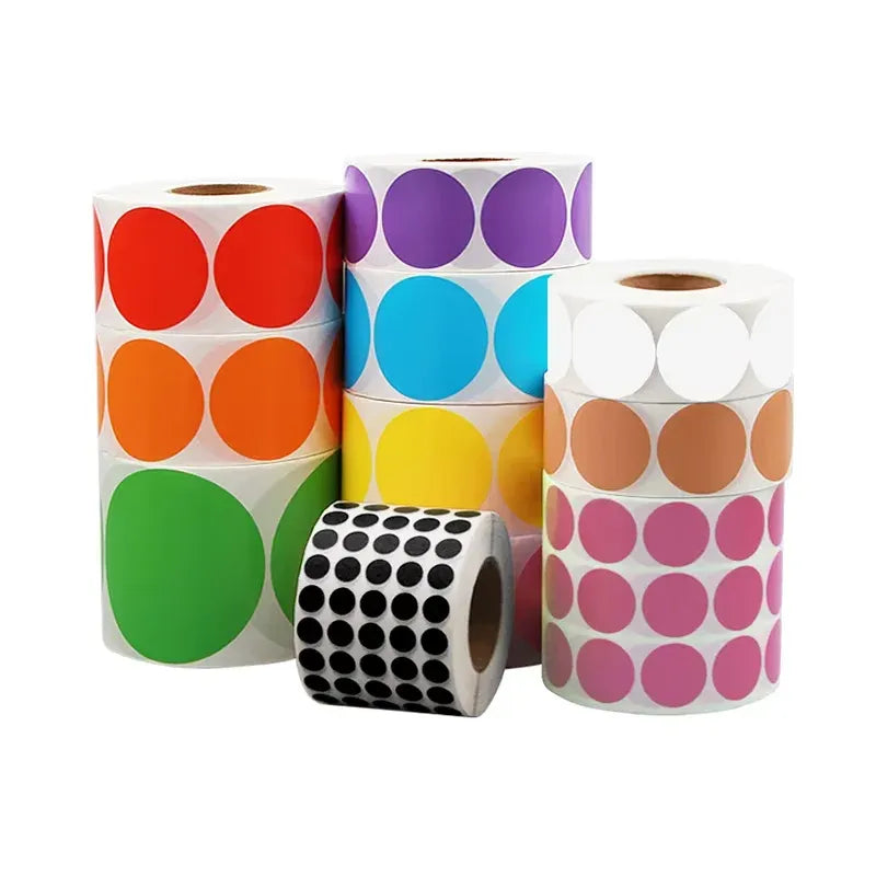 Assorted sticker rolls with multicolor circular labels on white backing
