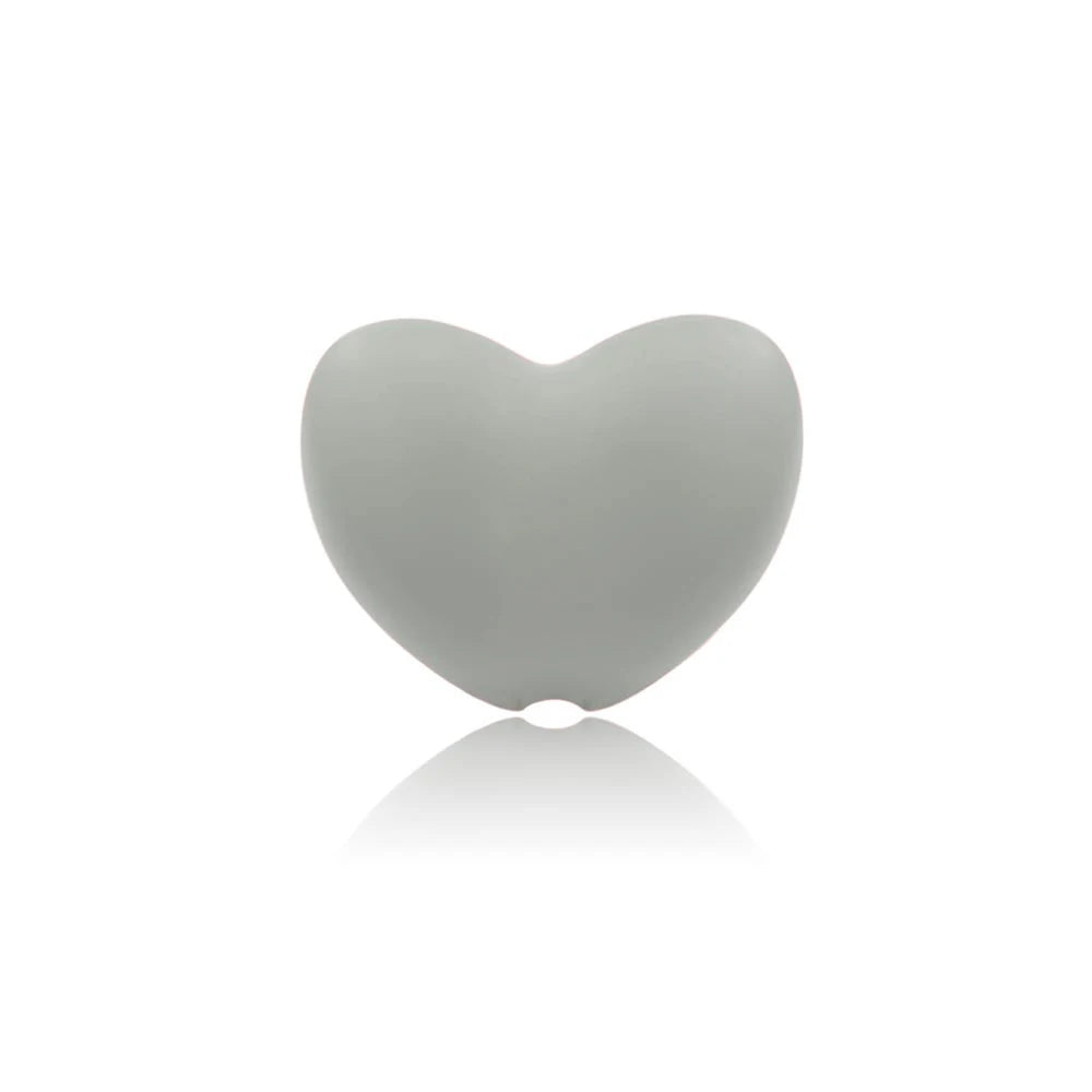Grey heart-shaped silicone baby teething toy for soothing sore gums.