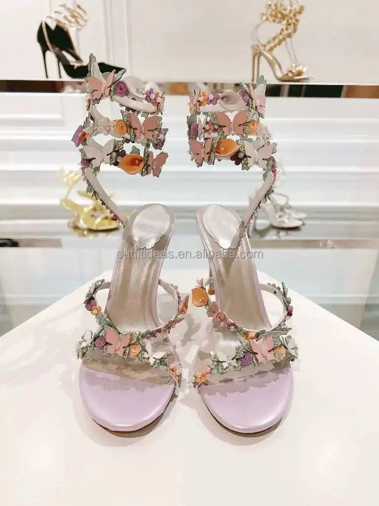 Lavender satin high-heel sandals with butterfly and floral embellishments, perfect for luxury bridal or evening wear.